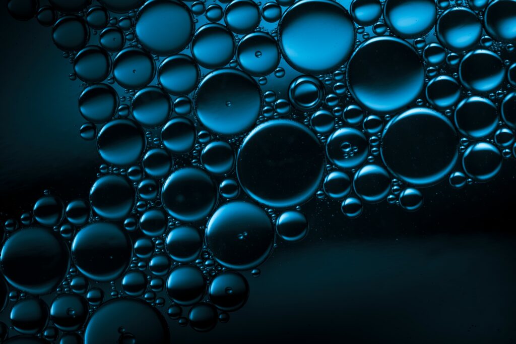 dark water drops in blue light