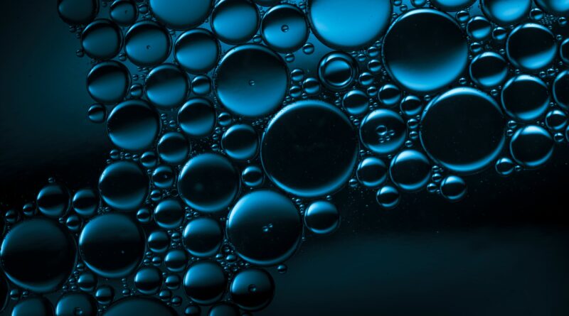 dark water drops in blue light